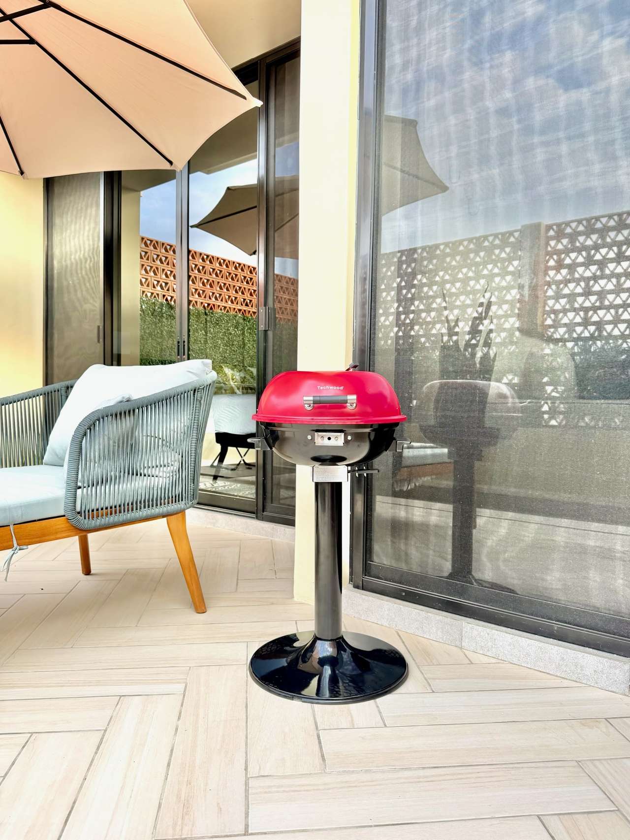Patio with BBQ grill and lounge chair
