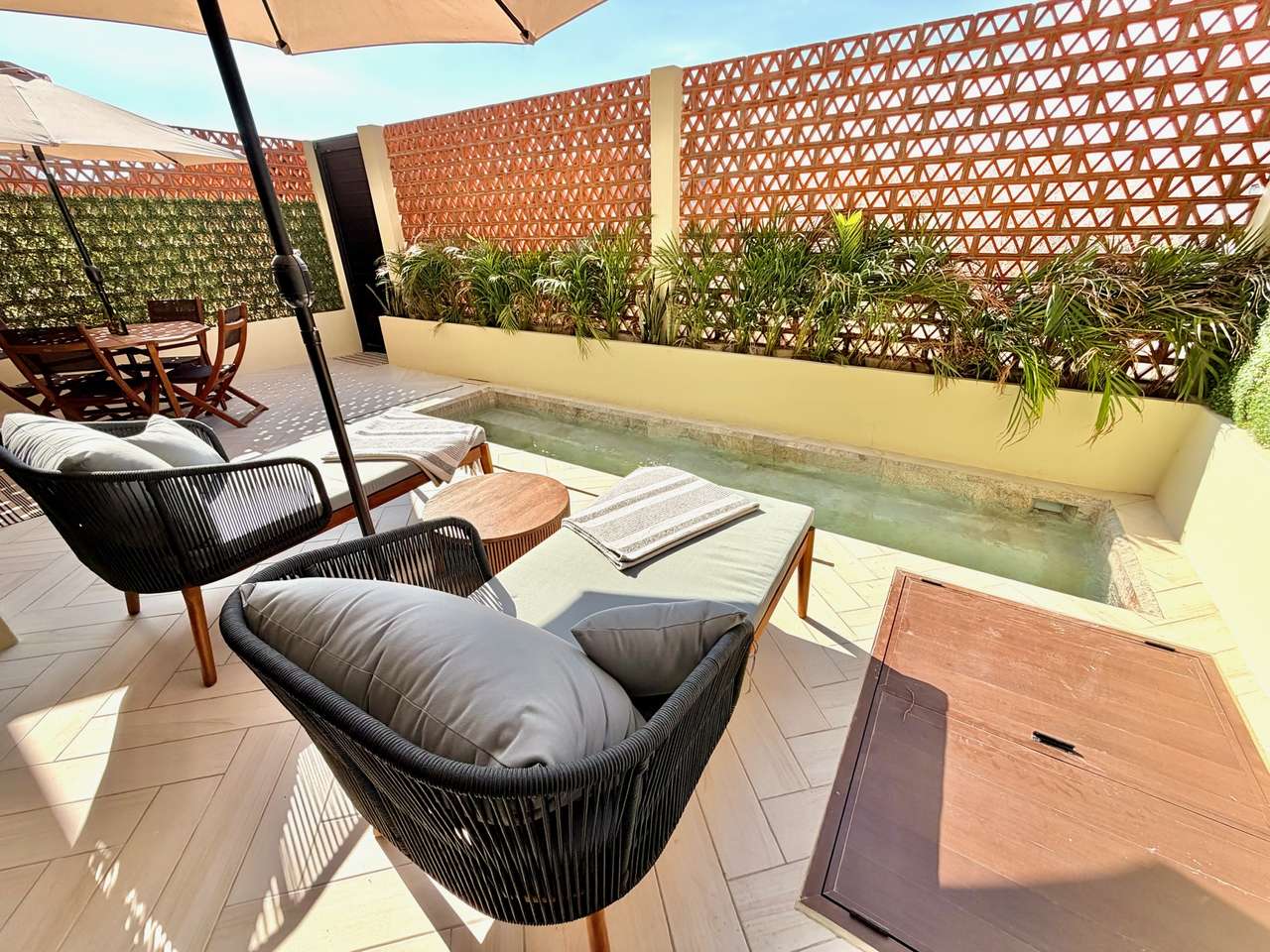 Patio with BBQ grill and lounge chair