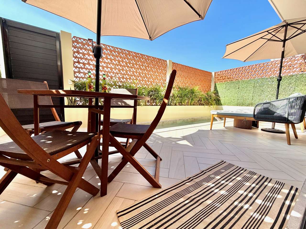 Patio with BBQ grill and lounge chair