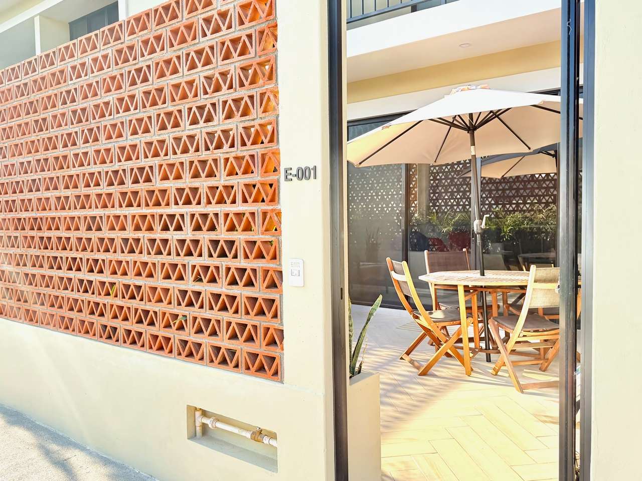 Patio with BBQ grill and lounge chair