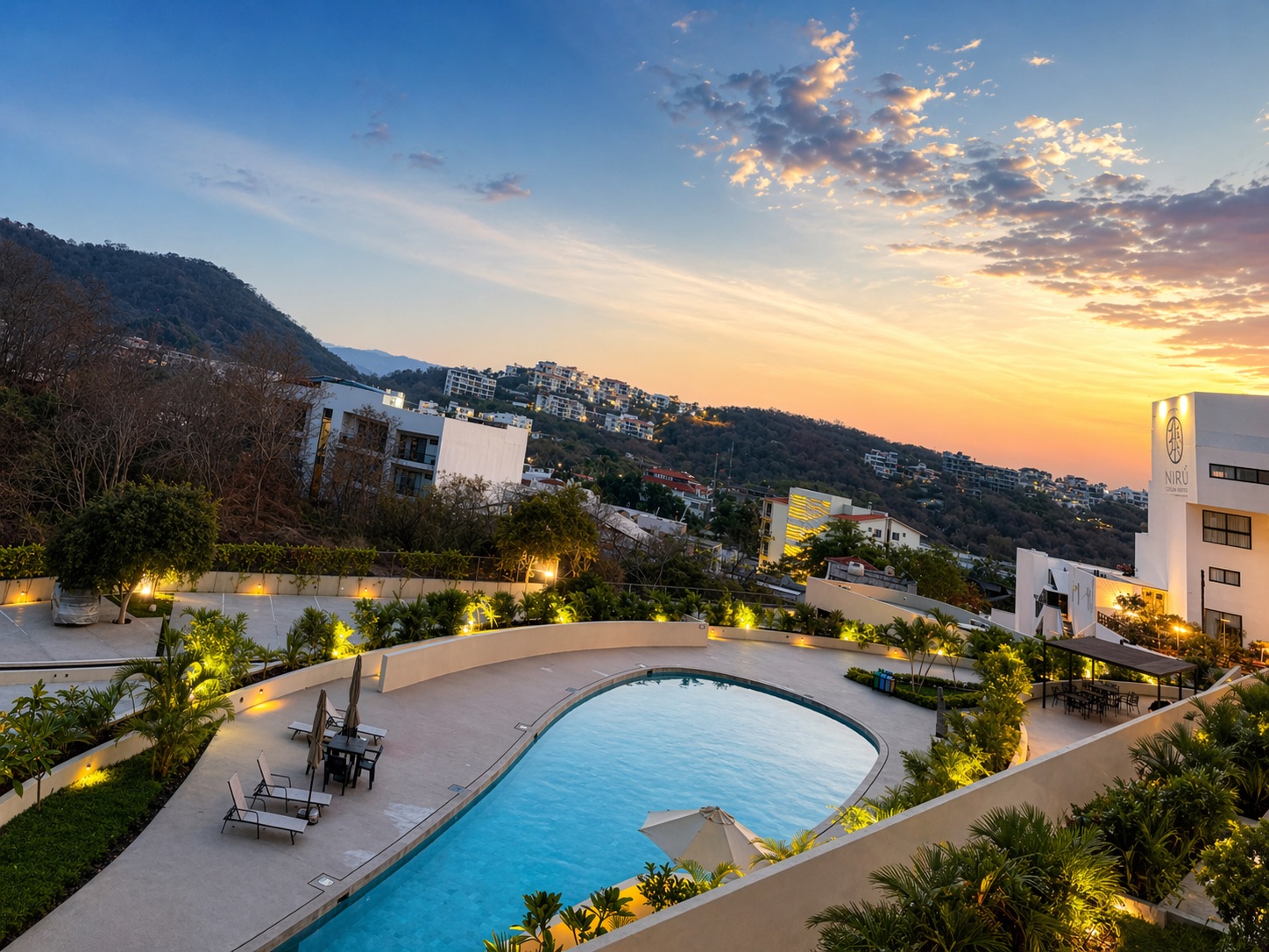 Sunset over the Sierra Madre — Nirú pool and Santa Cruz hillside from the balcony