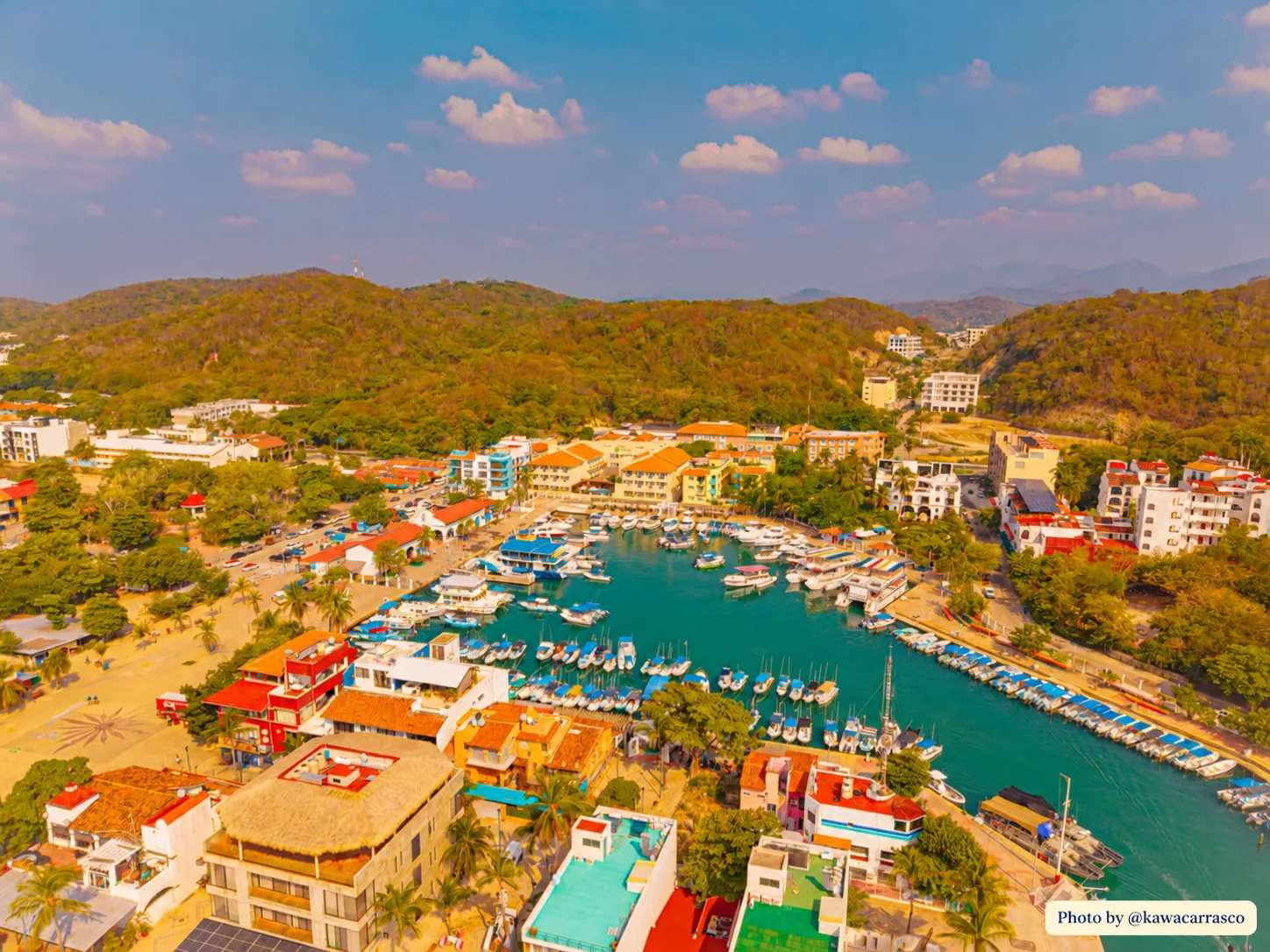 Aerial view of the Santa Cruz marina with the Sierra Madre behind